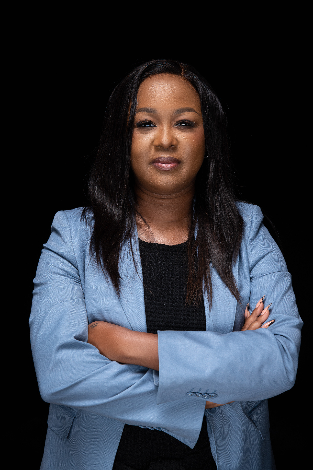Portrait of Naomi Mbugua Mutinda, Founder & Lead Strategist at Milk & Honey Marketing